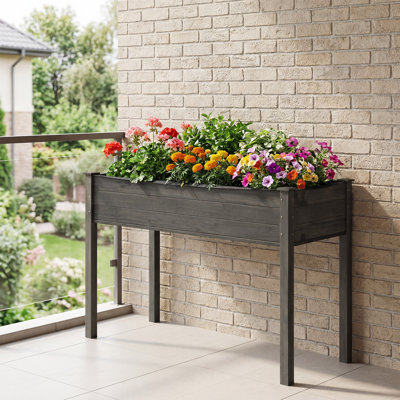 Pot à fleurs surélevé en bois Juluis