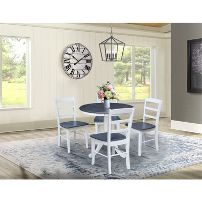 Gadmann Pedestal Extendable Solid Wood Dining Set