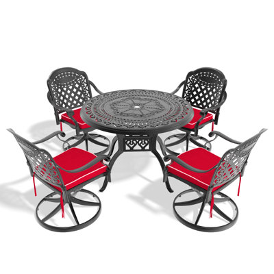 L'ensemble de salle à manger en aluminium coulé Allweather comprend des chaises pivotantes et une table ronde avec cadre noir