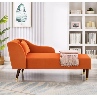Magnifique chaise orange recouverte de velours