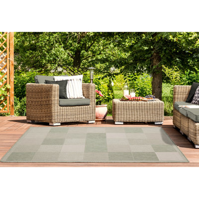 Tapis vert à motif géométrique Faro