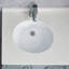 Lavabo ovale blanc Ã  encastrer avec trop-plein