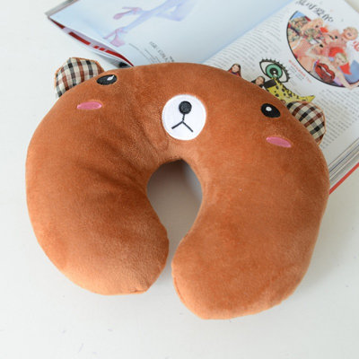 Joli coussin en forme de U