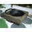 Wood-Fueled Outdoor Fire Pit With Wood Grain Design