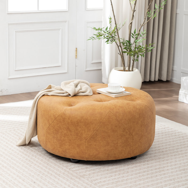 Castanedo Upholstered Round Ottoman, Polyester - Vintage Yellow