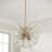 18" W x 18.25" H 8-Light Starburst Pendant in Matte Brass with Patterned Glass Petals
