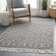Tapis noir / blanc en laine tissé à plat à la main à motif géométrique Carletta