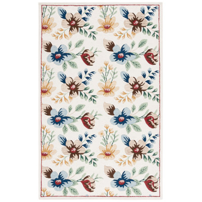 Abbeygail Hand Tufted Wool/Cotton Performance Floral Rug in Ivory/Blue
