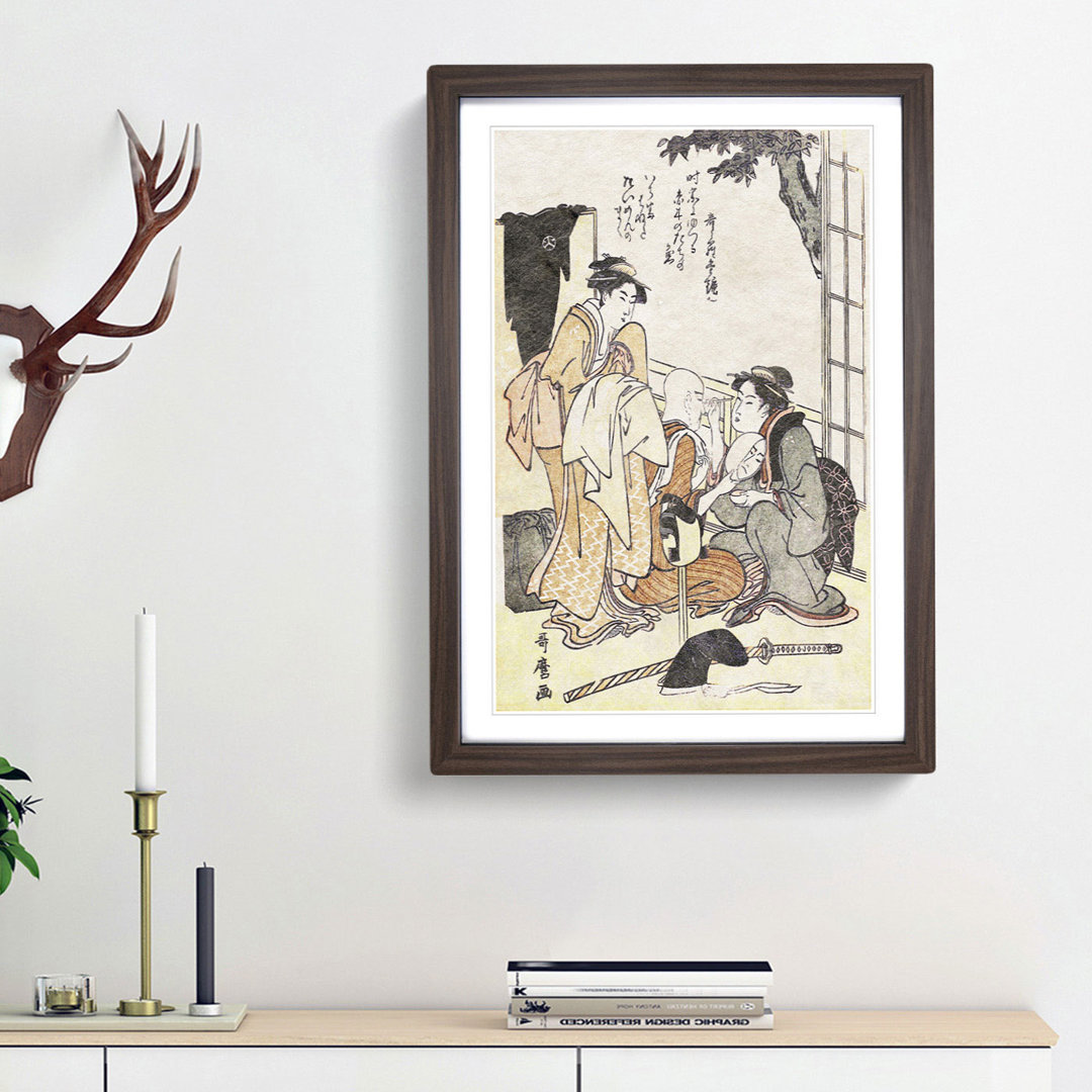 Dressing the Actor by Kitagawa Utamaro - Framed Print