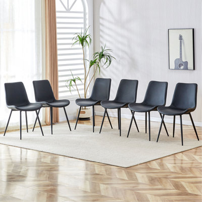 Chaise de salle à manger à dossier noir en cuir artificiel, pieds en métal noir, conception de coussin incurvé élargi pour plus de confort, convient aux restaurants, cuisines, chambres à coucher, bureaux. (6 chaises)