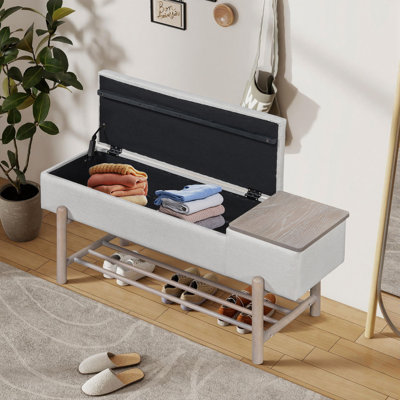 Banc de rangement rembourré avec compartiment caché