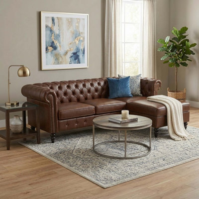 Canapé modulaire en L de 85 po à 4 places avec repose-pieds avec rangement, canapé modulaire en cuir de polyuréthane avec dossier capitonné, accoudoirs courbés décorés de rivets et pieds en bois de bouleau massif pour le salon