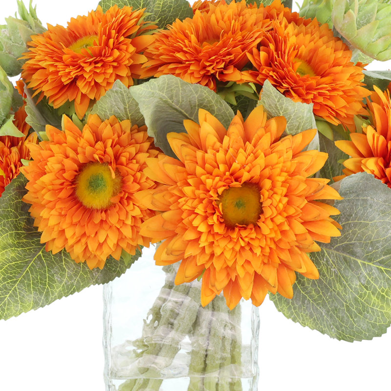 Arrangement d'automne tournesol dans un vase ondulé en verre
