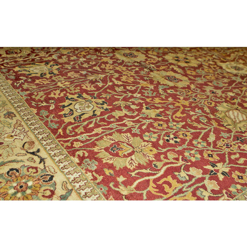 Tapis rouge et or de haute qualité noué à la main