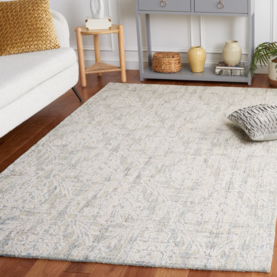 Tapis damassé en laine et coton bleu clair / ivoire Chaleb