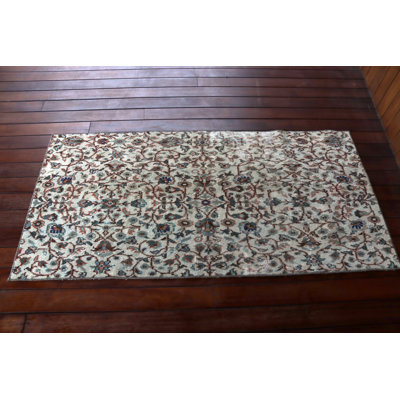 Élégant tapis de porte turc rétro avec un motif floral unique avec de riches tons terreux pour une décoration chic