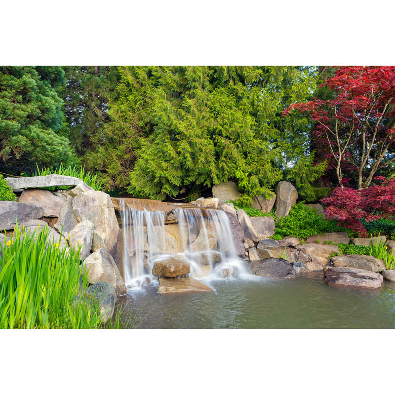 Garden Backyard Landscaping With Rocks Boulders Waterfall Trees And Plants by JPLDesigns - Wrapped Canvas Print