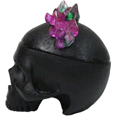 Figurine gothique en forme de crâne noir avec des cristaux
