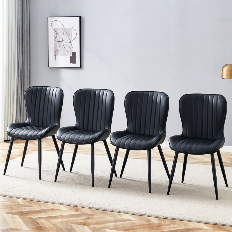 4 chaises ergonomiques noires - coussins moelleux pour une assise relaxante minimaliste s'adaptant à divers styles de décoration avec une apparence simple