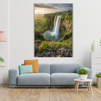 Tableau mural en verre trempé au coucher du soleil sur une cascade