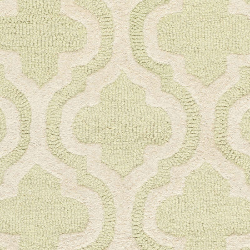 Handmade Light Green and Ivory Tufted Wool Round Rug