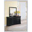 Élégante commode à finition noire Louis Philippe III avec six tiroirs spacieux, alliant élégance moderne et rangement pratique.-42518504