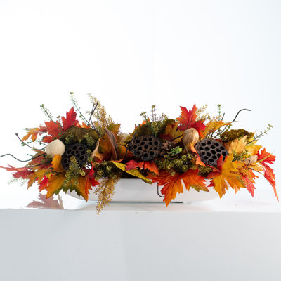 Arrangement floral mélangé dans un vase