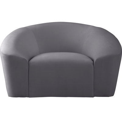 Fauteuil demi-tonneau en velours Alaw
