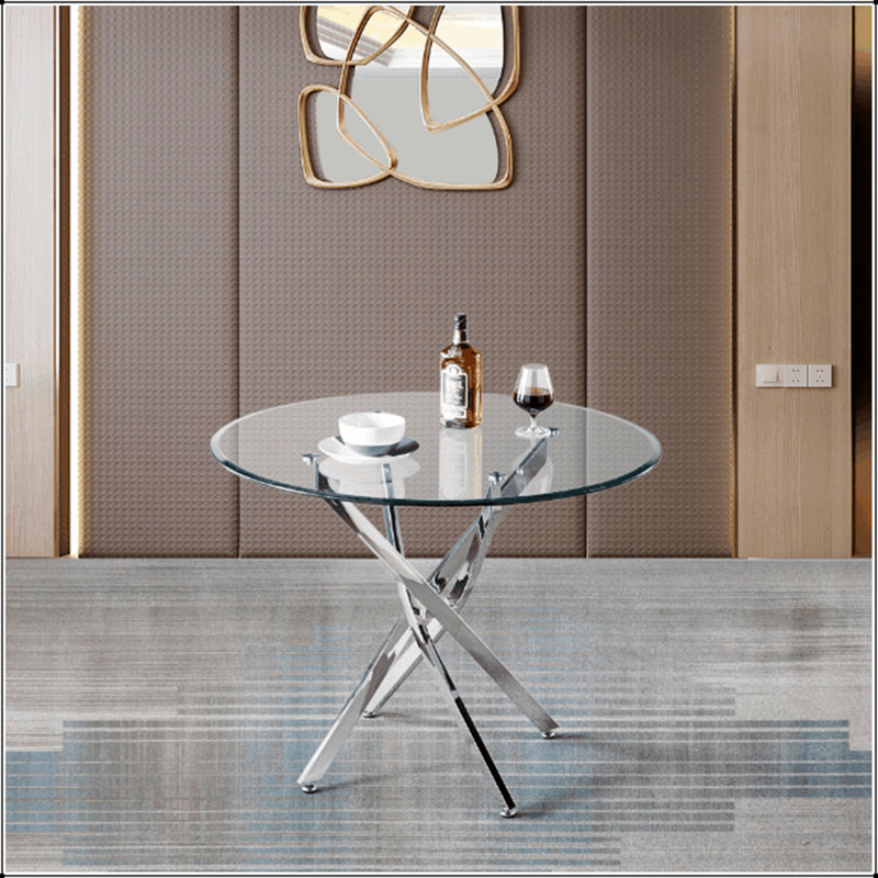 Table de salle à manger ronde contemporaine en verre trempé transparent avec pieds en acier inoxydable à finition argentée