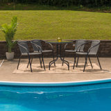 28'' Round Glass Table with Rattan Edging and 4 Rattan Stack Chairs