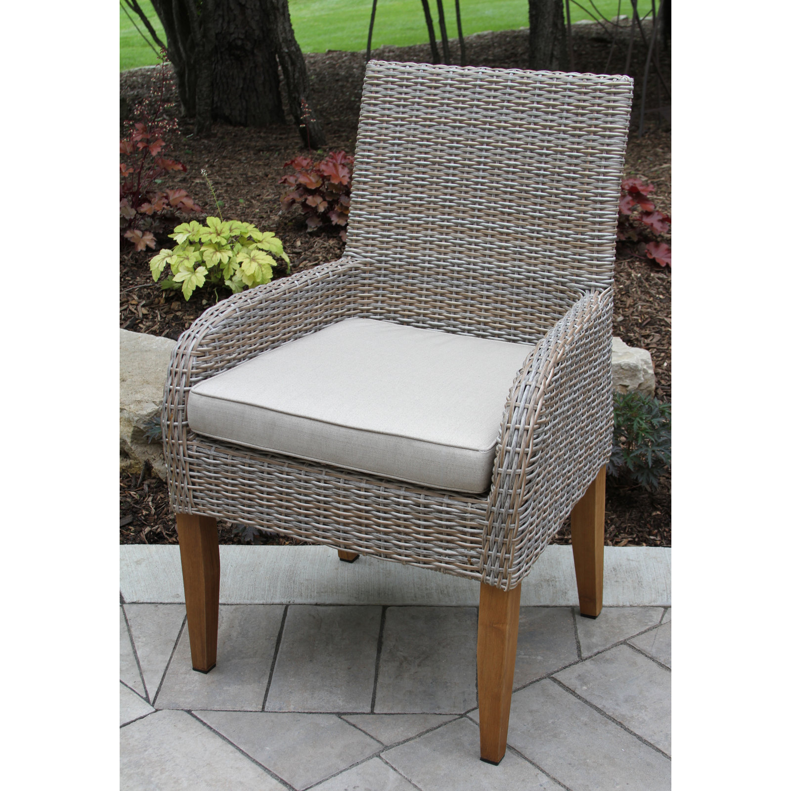 Akiva 52'' Round 4 - Person Outdoor Dining Set with Sunbrella Cushions