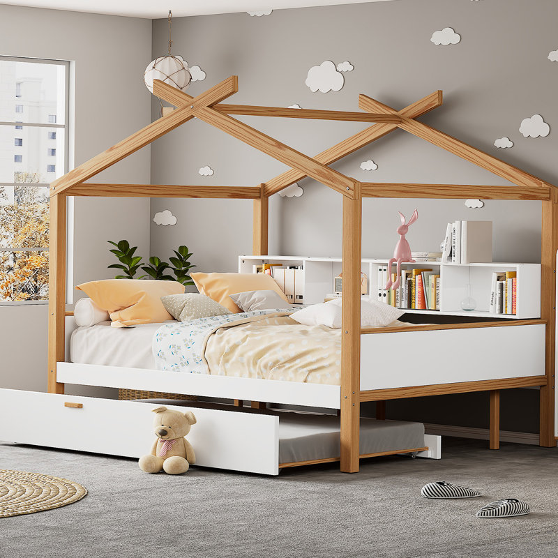 Lit en bois avec lit gigogne et bibliothèque, idéal pour les chambres d'enfants et les espaces invités