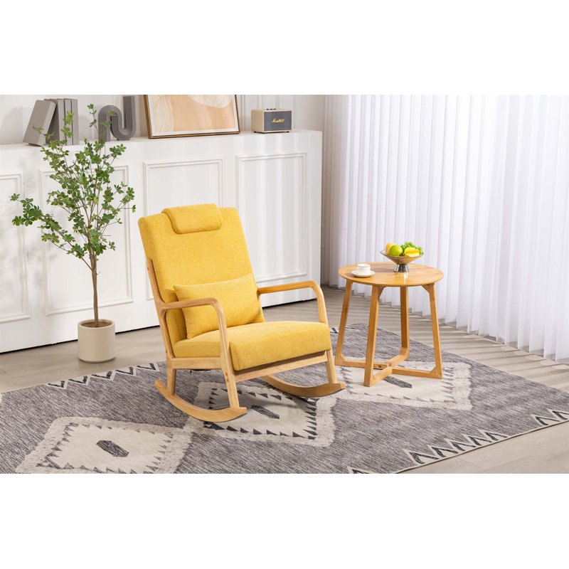Élégante chaise berçante rembourrée avec dossier haut et coussin lombaire pour une détente intérieure confortable