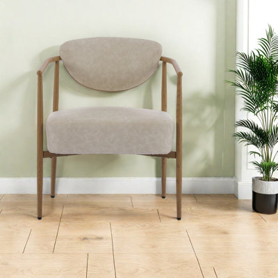 Élégantes chaises de salle à manger en polyuréthane beige, structure en fer, confort moderne pour la maison