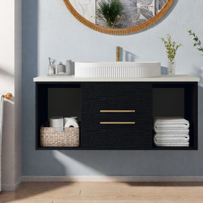 Meuble-lavabo moderne et peu encombrant avec lavabo ovale en céramique pour les petites salles de bain