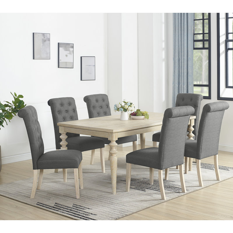 Ensemble de salle à manger 7 pièces comprenant une table de salle à manger à pieds tournés et 6 chaises capitonnées pour une expérience culinaire élégante et confortable