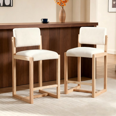 Two White Armless Bar Stools With Cushions, Solid Wood Legs, Backrests, And Footrests, Suitable For Use With Kitchen Islands, Dining Tables, And Bar Counters.