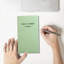 un mini-cahier A6-1064553080