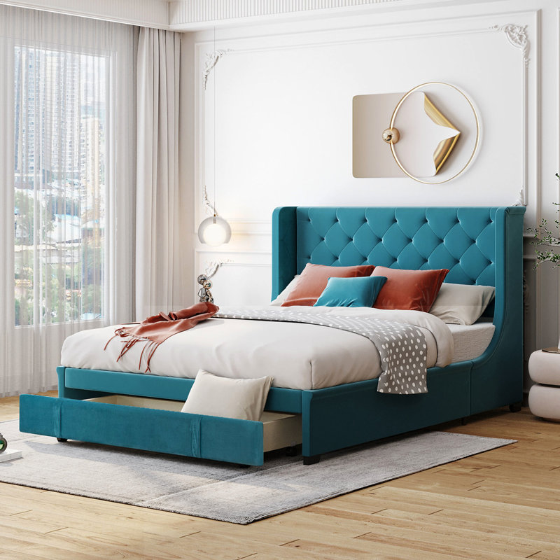 Grand lit avec revêtement en velours bleu et tête de lit à oreilles - Design élégant
