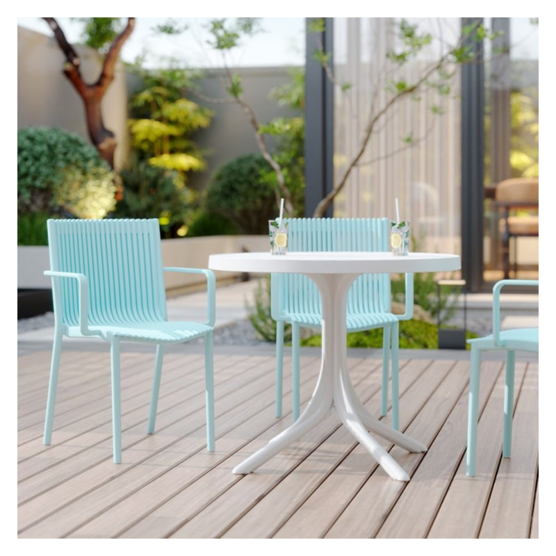 Ensemble de salle à manger d'extérieur moderne 4 pièces avec table ronde et fauteuils empilables bleu clair - Meubles en polypropylène toutes saisons pour le jardin, la terrasse et la piscine