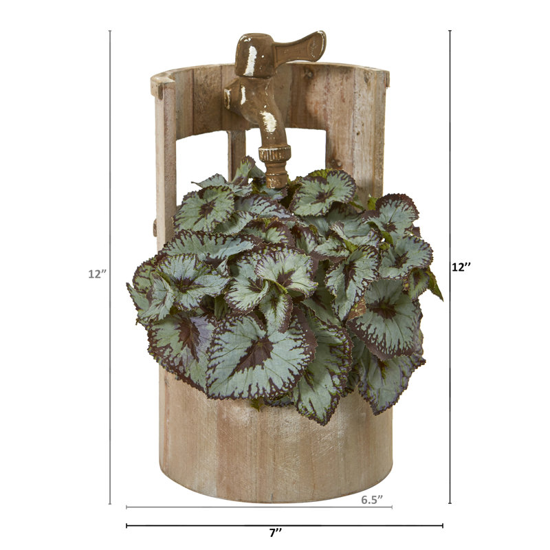 Plante begonia artificielle en pot de fleurs