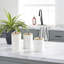 Ensemble de pots décoratifs en céramique blanche texturée avec couvercles en bois et décorations perlées