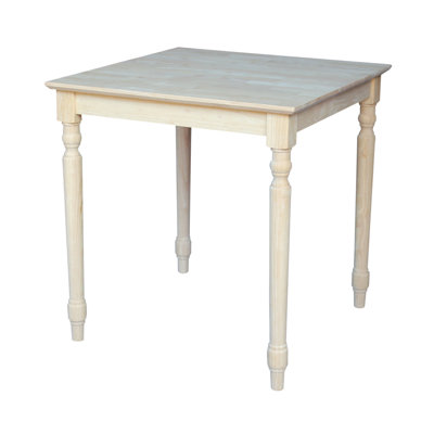 Turned Solid Wood Dining Table by International Concepts
