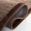 Heie Area Rug In Dark Brown