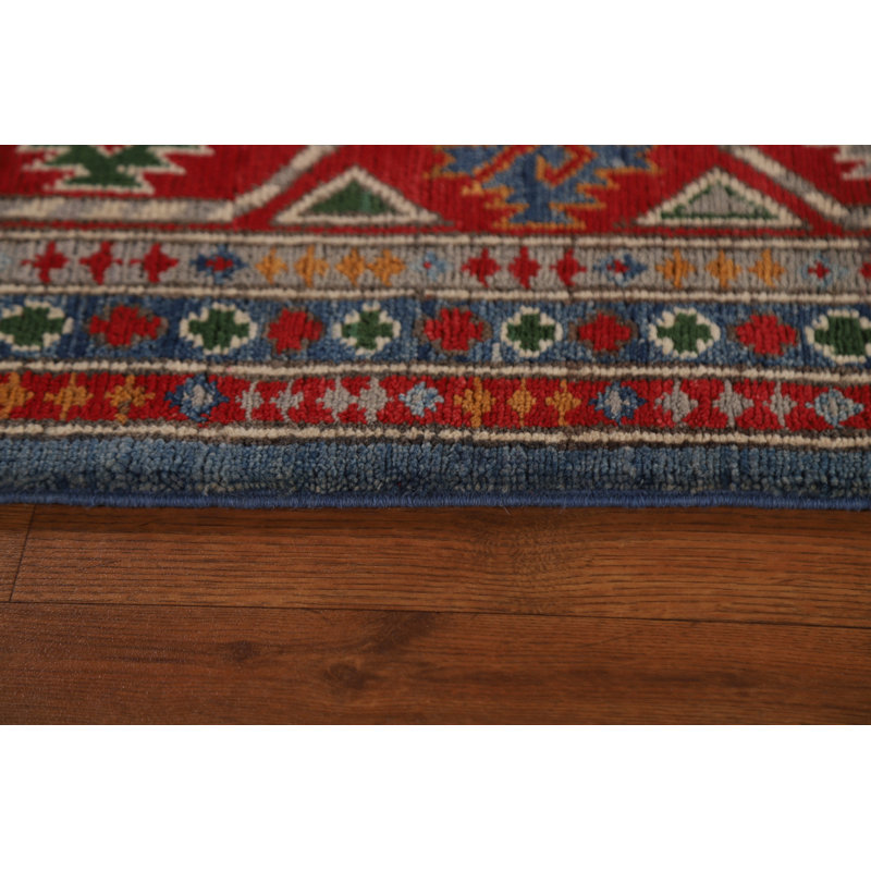 Tapis géométrique bleu Kazak fait à la main 7 x 10