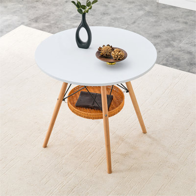 Table de salle à manger circulaire de 31,5 pouces de diamètre, plateau de table en panneau de fibres à densité moyenne, pieds en bois massif, avec structure de panier de rangement suspendue. Une table basse décontractée pouvant accueillir de 2 à 4 personnes.