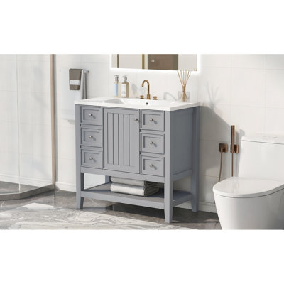 Meuble-lavabo moderne de 36 pouces avec lavabo en céramique blanc élégant, une porte d'armoire, trois tiroirs fonctionnels, construction en bois massif et finition grise, style autoportant, encastré