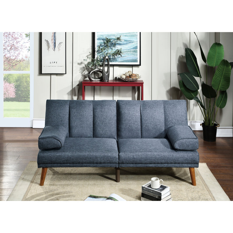 Méridienne convertible en mousse bleu marine avec siège en polyfibre, pieds en bois massif et coussin.