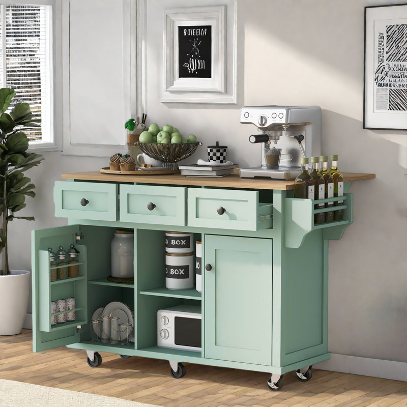 Îlot de cuisine avec comptoir rabattable, 5 roulettes, armoire de rangement, tablettes ouvertes et 3 tiroirs