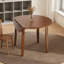 Table de salle à manger extensible ronde pour 2 à 4 personnes avec un design pliable et une fonctionnalité peu encombrante.-405330894